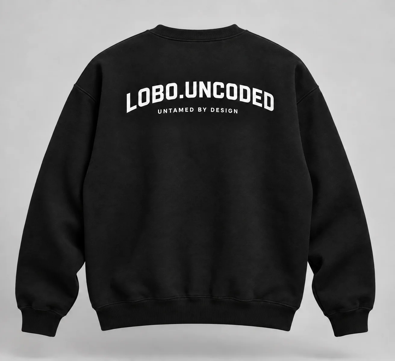 Black sweatshirt with an UNTAMED BY DESIGN back print